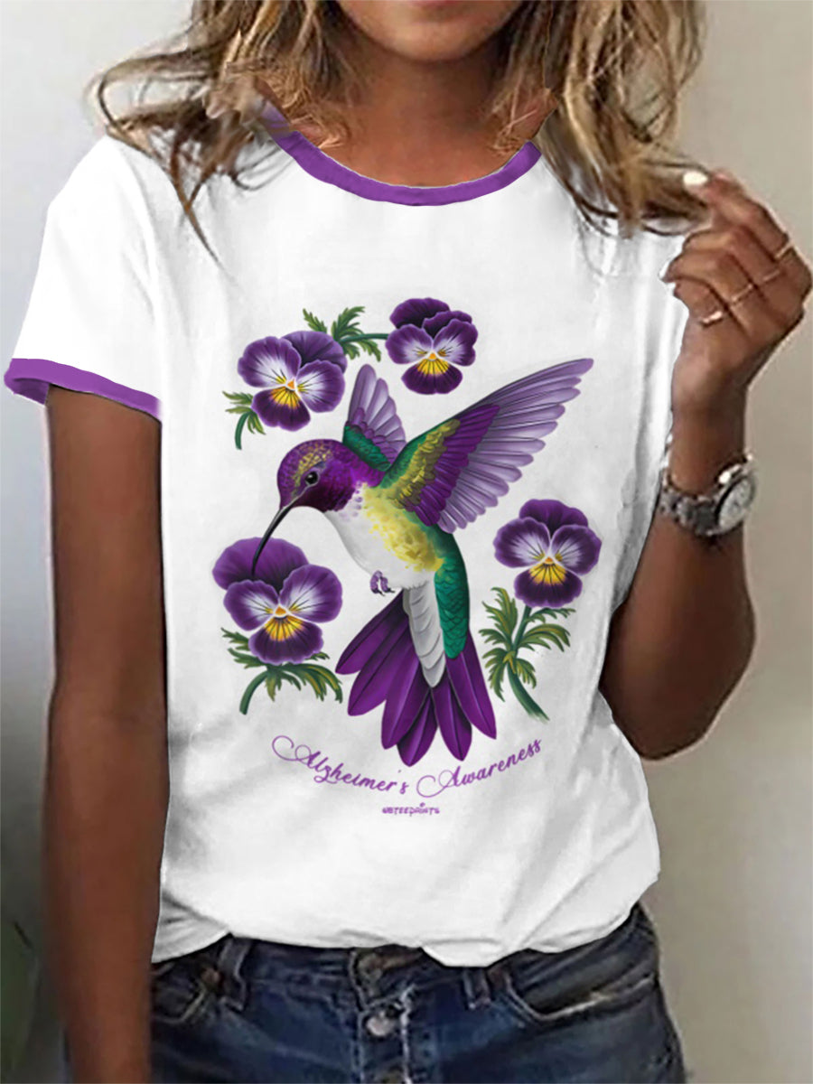 T-shirt violet pour femme avec motif colibri tenant une pensée violette et sensibilisation à la maladie d'Alzheimer