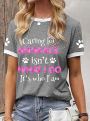 Women's caring for animals isn't what I do it's who I am T-shirt